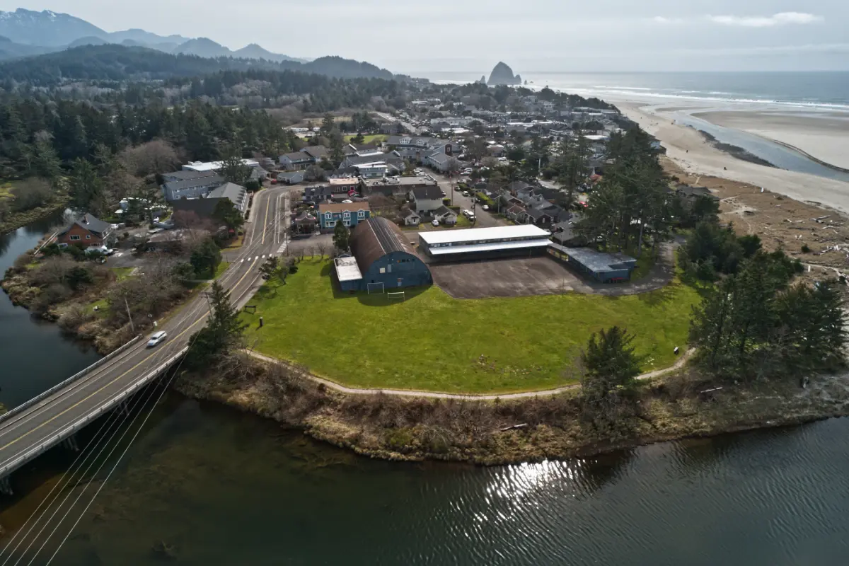 Aerial view looking from the North end of Cannon Beach, Oregon with city and beach Haystack in Background
